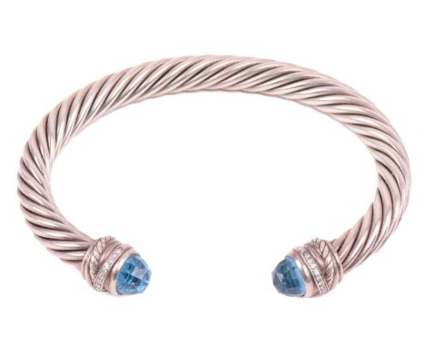 A gem-set torque bangle by David Yurman, composed of twisted cables, terminating with diamond-set rondelles and capped with f