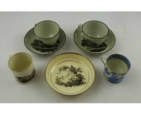 AN EARLY 19TH CENTURY COFFEE CAN, hand painted en grisaille with landscape and church, 6.5cm high, together with three bat pr