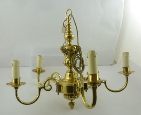 A LATE 20TH CENTURY LACQUERED BRASS FIVE LIGHT CEILING ELECTROLIER having circular "drip" pans and mask decorated centre, rec
