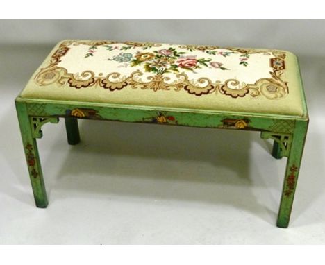 A DUET PIANO STOOL in the Chinese Chippendale taste, having Chinoiserie gilded decoration on a celadon green ground, with flo