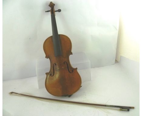 A LATE 19TH CENTURY VIOLIN, internal label "Stradivarius 1721", back 37cm, with bow 