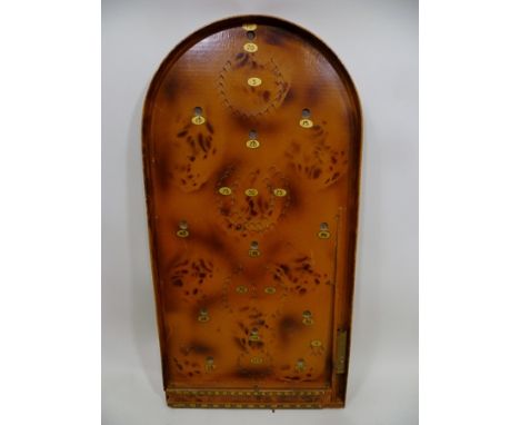 AN EARLY TO MID 20TH CENTURY BAGATELLE GAME, board with pyrograph decoration 76cm 