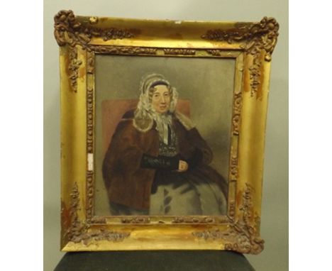 19TH CENTURY BRITISH SCHOOL A portrait of a lady wearing a bonnet, an Oil on board, see label verso, 35cm x 30cm in gilt fram