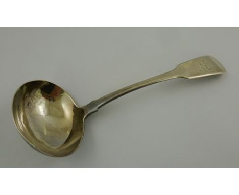 CHARLES MARSH A GEORGE IV IRISH SILVER SAUCE LADLE, of fiddle pattern, Dublin 1829, engraved with elephant crest, 60g. 