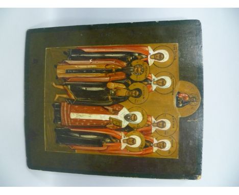 LATE 19TH CENTURY RUSSIAN SCHOOL A Portrait Icon of eight standing under God on high, Oil on pine panel, 31cm x 26cm 