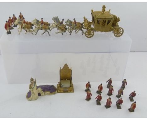 A "JOHILLCO" QUEEN ELIZABETH II CORONATION COACH WITH HORSES, cast painted metal, a model of The Queen in state robes 7cm hig