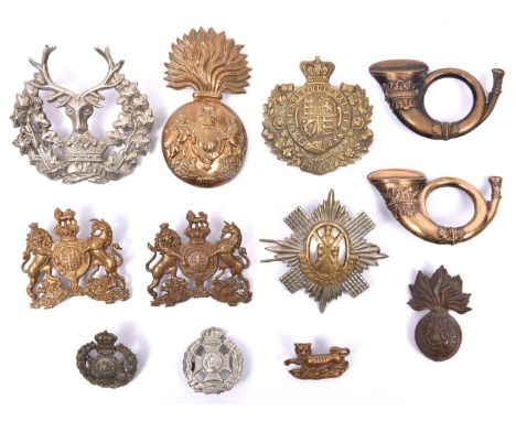 An early side cap badge of the Hampshire Regiment, as for the centre of the ORs HPC; small size Victorian Ryl Fusiliers cap b