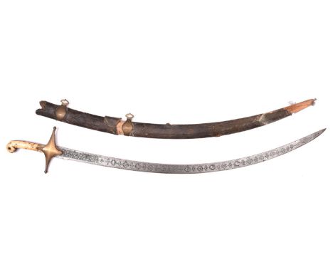 A Persian shamshir, blade 33" with chiselled panels for its entire length depicting foliage and birds, with brass crossguard 