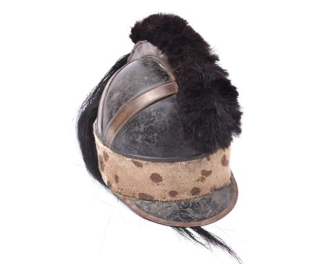 An old, possibly theatrical, copy of an 18th century Light Company or cavalry helmet, brass mounted with hair crest and tail,