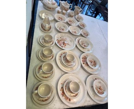 A decorative Poole dinner set