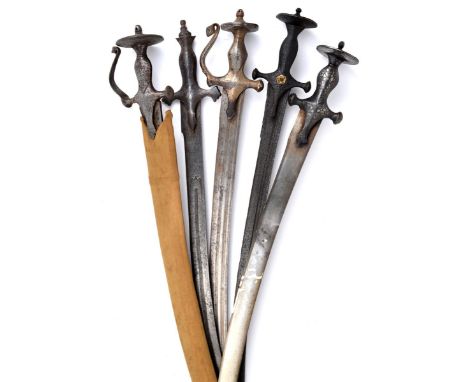 A group of five Asian swords, comprising: four Indian tulwar, with curved blades and characteristic Indo-Muslim hilts, two ha