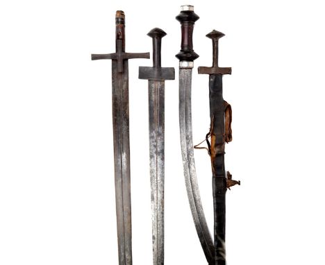 A Sudanese sword (kaskara), broad double edged blade 37 in., iron crosspiece with squared-off quillons and langets, wooden gr