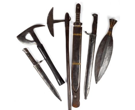 A collection of edged weapons, including: three German S98/05 bayonets, one with scabbard and one a saw back variant; a Swiss