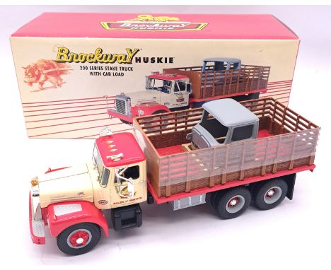 1st (First Gear) a boxed 1:34 scale M1384 Brockway Huskie 200 Series Stake Truck With Cab Load. Although not checked for comp