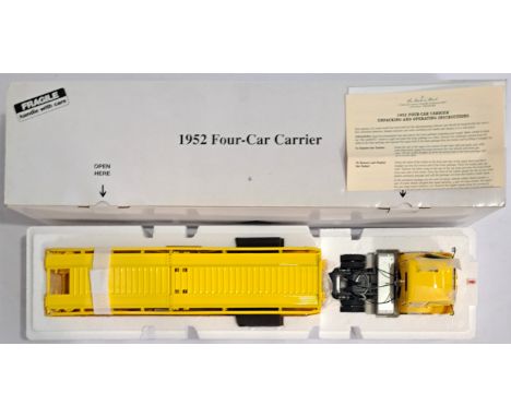 Danbury Mint, a boxed 1:24 scale 1952 Four-Car Carrier in bright Yellow and Black trim. Condition appears to be Excellent to 