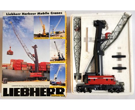 Conrad, a boxed 1:87 scale&nbsp; No.2111 Liebherr Harbour Side Mobile Crane in Red and Grey finish (requires some cleaning). 