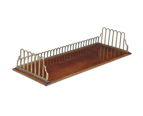A mahogany and gilt brass galleried book tray, first quarter 19th century, the arcaded gallery above the rectangular base wit