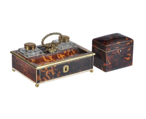 ϒA Regency or George IV ivory banded and gilt metal mounted tortoiseshell standish, circa 1820, the rectangular section body 