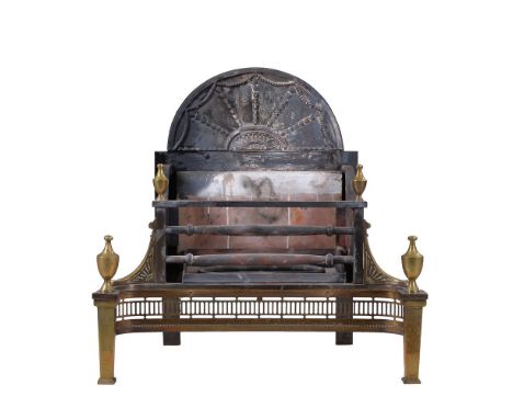 A cast iron, steel and brass mounted fire grate in George III Adam style, the arched backplate relief cast with beading, bell