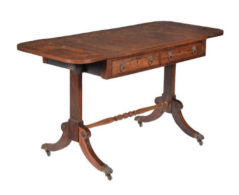 ϒA Regency rosewood sofa table, circa 1815, with two frieze drawers and two opposing false drawers, 72cm high, 130cm wide (op