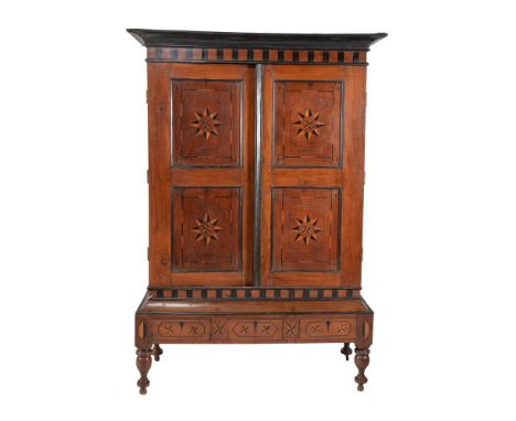 A Ceylonese hardwood and inlaid press cupboard, first half 19th century, 206cm high, 136cm wide, 57cm deep