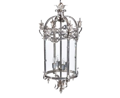 A silver coloured metal and glazed cylindrical hall lantern, second half 20th century, the four bowed panes beneath a gallery