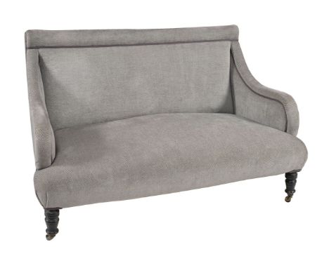 A Victorian ebonised and upholstered sofa, late 19th century, 91cm high, 131cm wide, 78cm deep