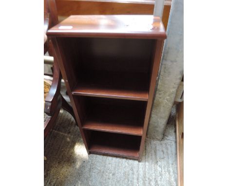 A small modern mahogany shelf