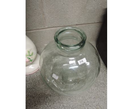 A vintage glass carboy 