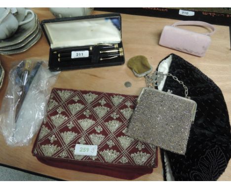 A selection of misc including vintage purses, pen set etc