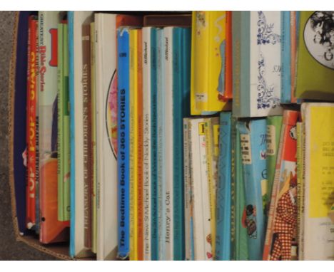 A shelf of mixed vintage childrens annuals and story books including Bedtime Stories, Fairy Tales etc