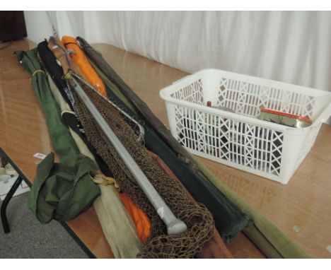 A selection of fishing rods including Shakespeare Omni SP1300, a Craddock, a Shakespeare Sigma graphite etc, vintage reels an
