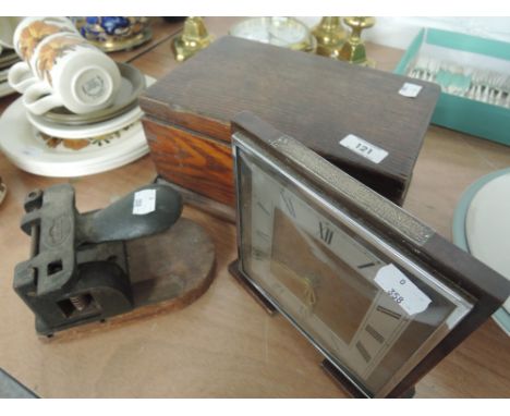 An oak box containing vintage buttons etc, a mid 20th century Metamec mantle clock and a vintage hole punch