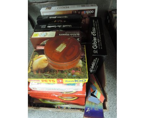 A selection of vintage jigsaws and games including Chad Valley Peg Pictures, Waddingtons Circular jigsaws etc