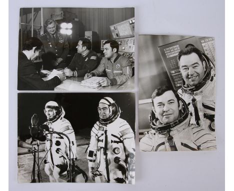 Soviet Cosmonaut Press Photographs, 1977.- a group of three black and white Soviet press photographs, depicted engineer, Geor