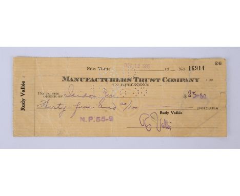 Rudy Vallee Original hand-signed cheque.- date stamped December 12, 1935, from the Manufacturers Trust Company, New York, mad