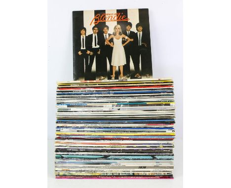 146 x 80s Pop Lps. Michael Jackson, Blondie, Madonna, Elton John, Wham! And many more.Condition Report:  Average Condition VG