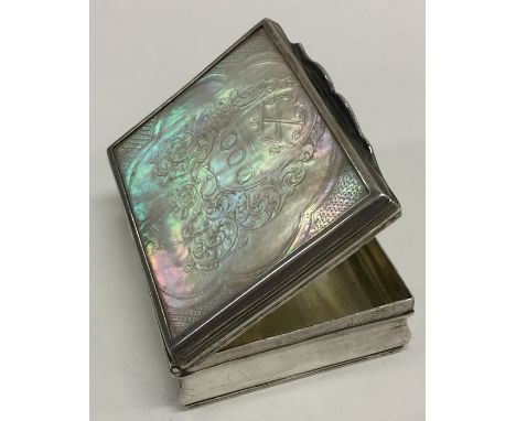 PAUL JACOB LUNDBECK: A rectangular silver snuff box, the MOP cover carved with crest. Approx. 110 grams. Est. £200 - £300.