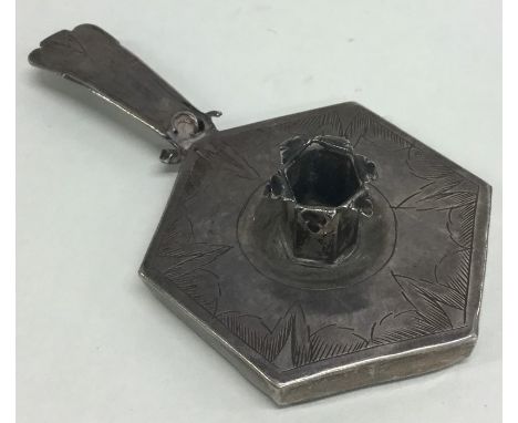 A Continental 17th Century silver chamber stick engraved with leaves. Approx. 20 grams. Est. £100 - £150.