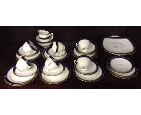 A large blue ground Royal Albert part tea service with gilt border. Est. £30 - £40.