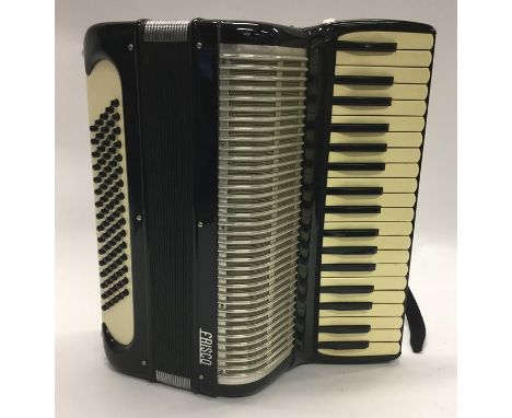 A cased accordion by Frisco. Est. £30 - £50.