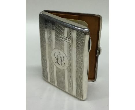 An engine turned silver purse decorated with fitted interior. Chester. By WN. Approx. 122 grams. Est. £50 - £80.