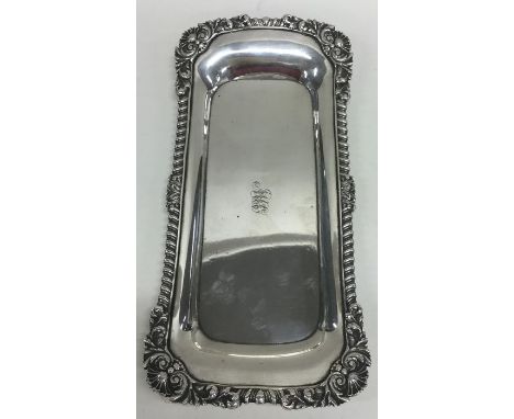 PAUL STORR: A rare George III silver snuffer tray with gadroon rim. London 1785. Approx. 23 cms x 10.5 cms. Approx. 257 grams