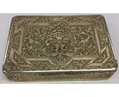 A rare French silver gilt snuff box attractively decorated with scrolls, flowers and engine turned decoration. Approx. 148 gr