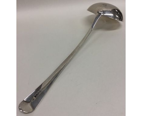 An OE and bead pattern soup ladle of typical design. London. By RC. Approx. 200 grams. Est. £100 - £120.