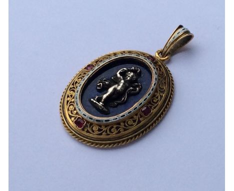 An Antique enamel and ruby pendant, the centre decorated with cherub in gold frame. Approx. 10 grams. Est. £800 - £1200.