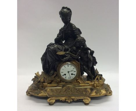 A good quality French mantle clock decorated with figures and winged infants with white enamelled dial. Approx. 52 cms high. 