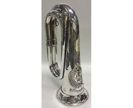 A rare and unusual full size silver bugle of typical design with crested front. London. By Hawkes &amp; Son. Approx. 759 gram