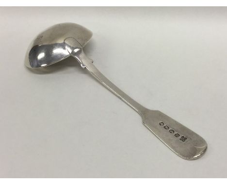 EXETER: A silver fiddle pattern sauce ladle. By JW&amp;JW. Approx. 65 grams. Est. £30 - £40.