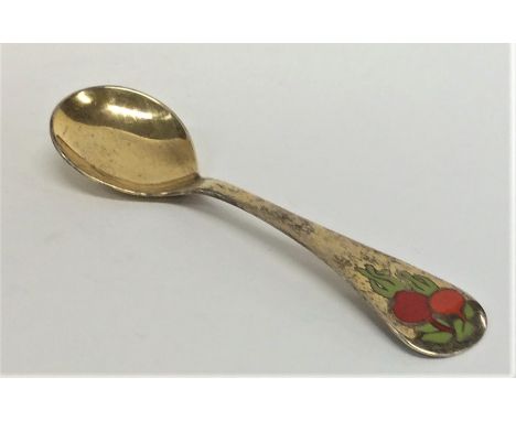 GEORG JENSEN: A modern silver gilt and enamel preserve spoon with textured body. Approx. 46 grams. Est. £35 - £45.